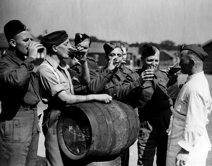 British troops released from a German prison camp 1944 drinking English beer for the first time in four years WW2